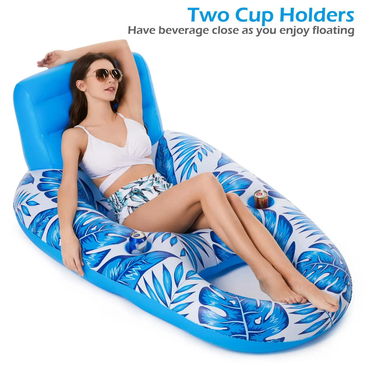 Woman lying on the inflatable lounger with drinks in the two cup holders on the side tubes